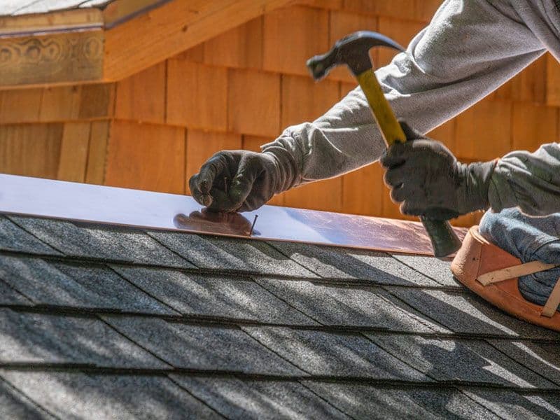 Roof repair in progress on an Auckland home